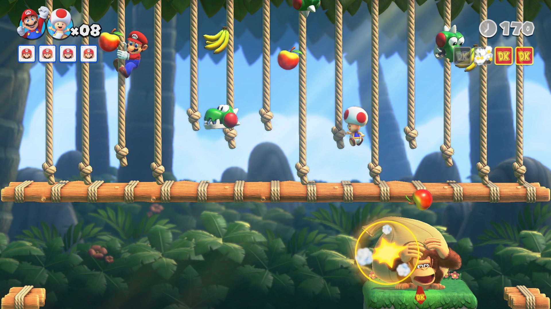 Il gioco laterale Mario vs. Donkey Kong. Qui, Mario si arrampica su una serie di corde in un livello della giungla, mentre sotto Donkey Kong si nasconde, per qualche motivo. Forse Mario sta lanciando cose, cosa che non è molto carina da parte sua.