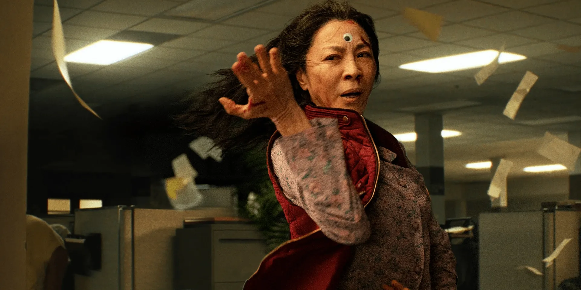 Michelle Yeoh strikes a martial arts pose in Everything Everywhere All at Once