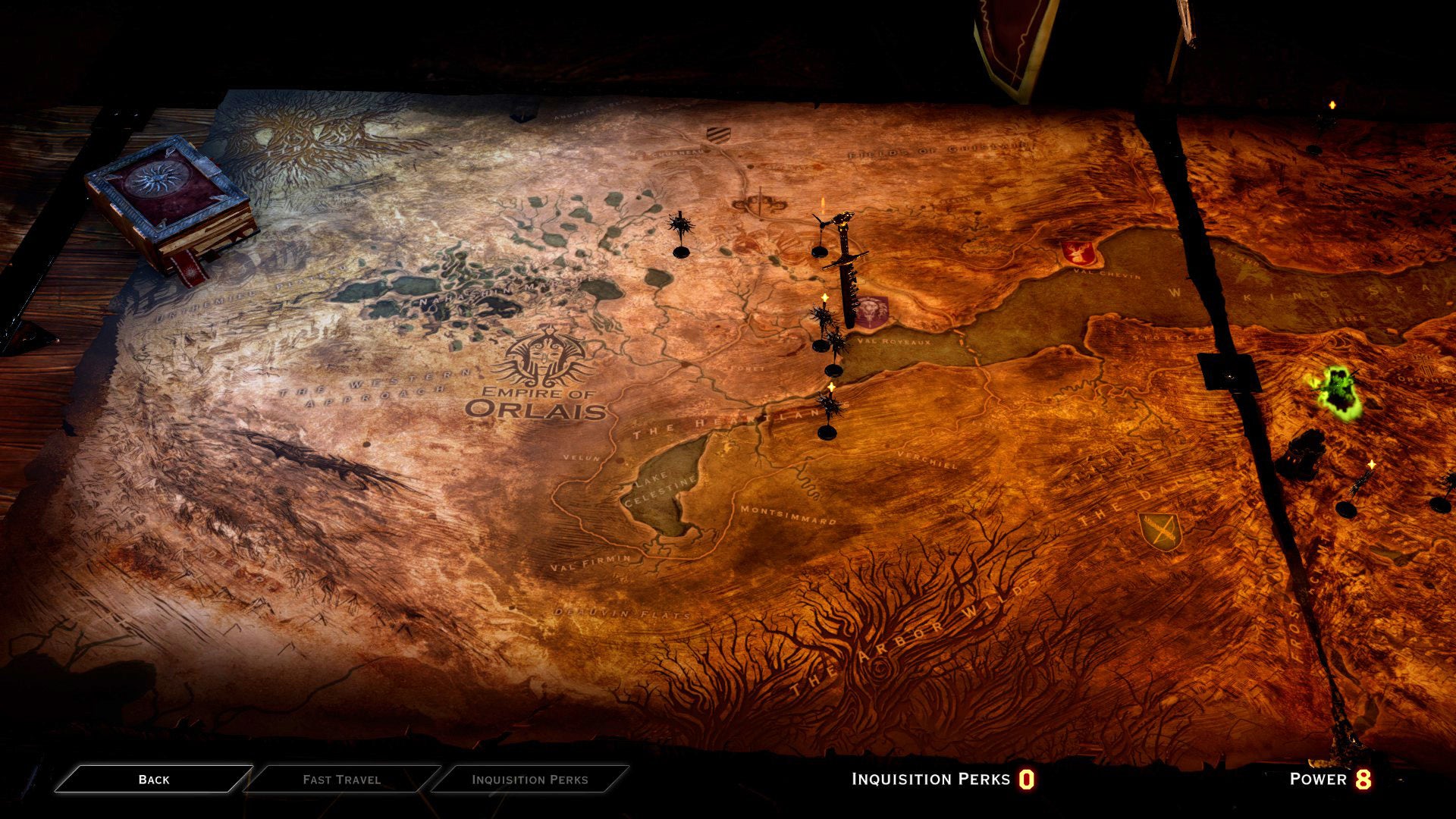 A screenshot of the War Table map in Dragon Age: Inquisition, showing the game's map of Thedas spread out on the table before you.