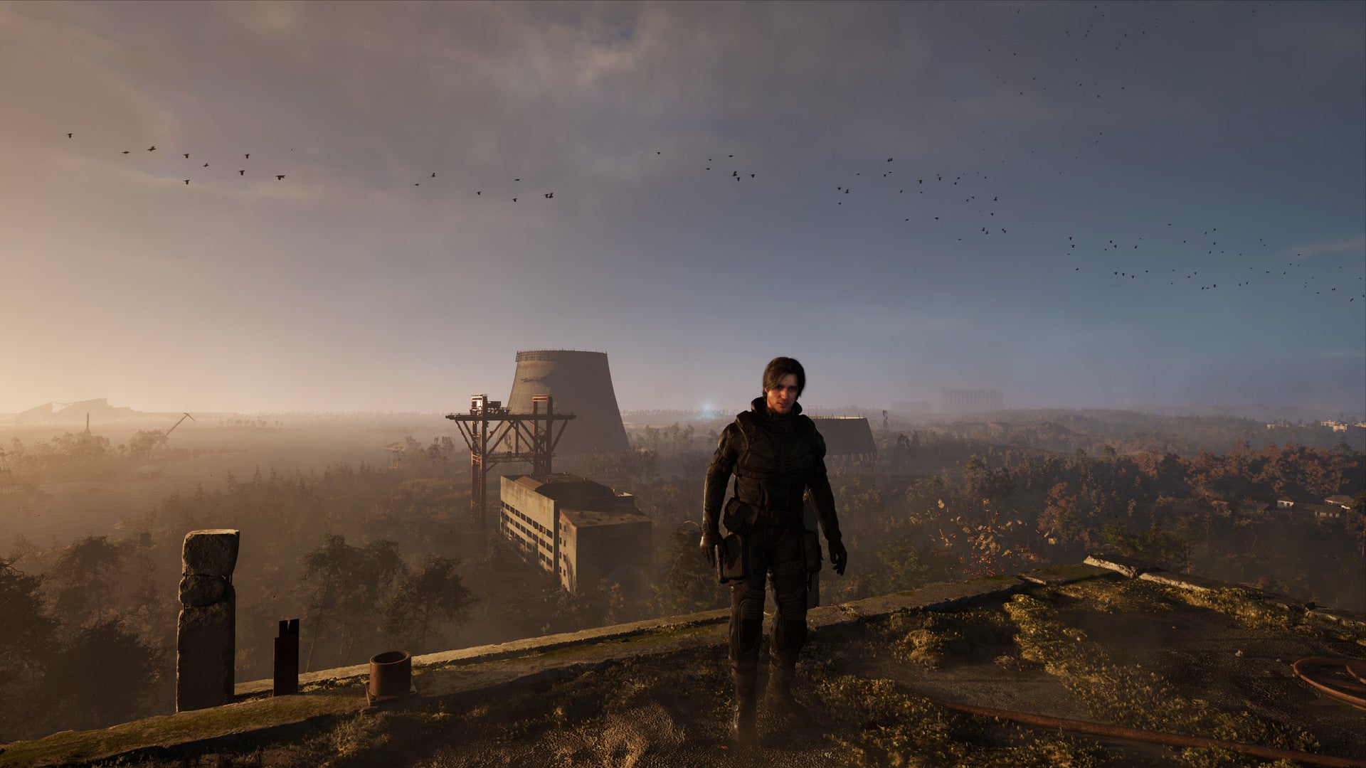 一个男性角色站在一个高楼上，俯瞰着似乎是切尔诺贝利核电站的景色