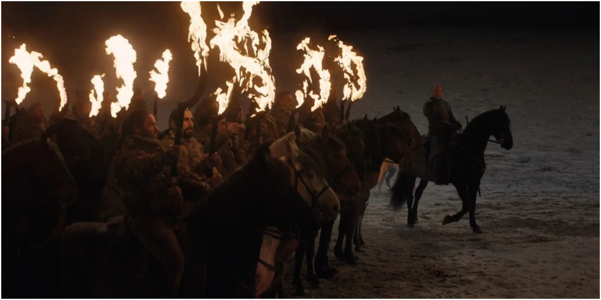 Melisandre accende gli Arakhs dei Dothraki prima della Battaglia di Grande Inverno in Game of Thrones