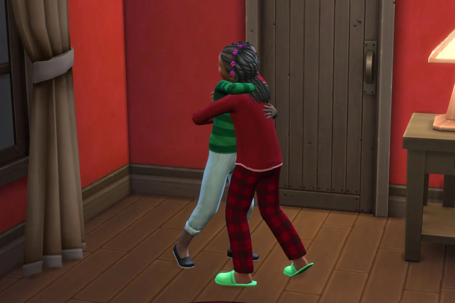 Dois Sims crianças se abraçando.