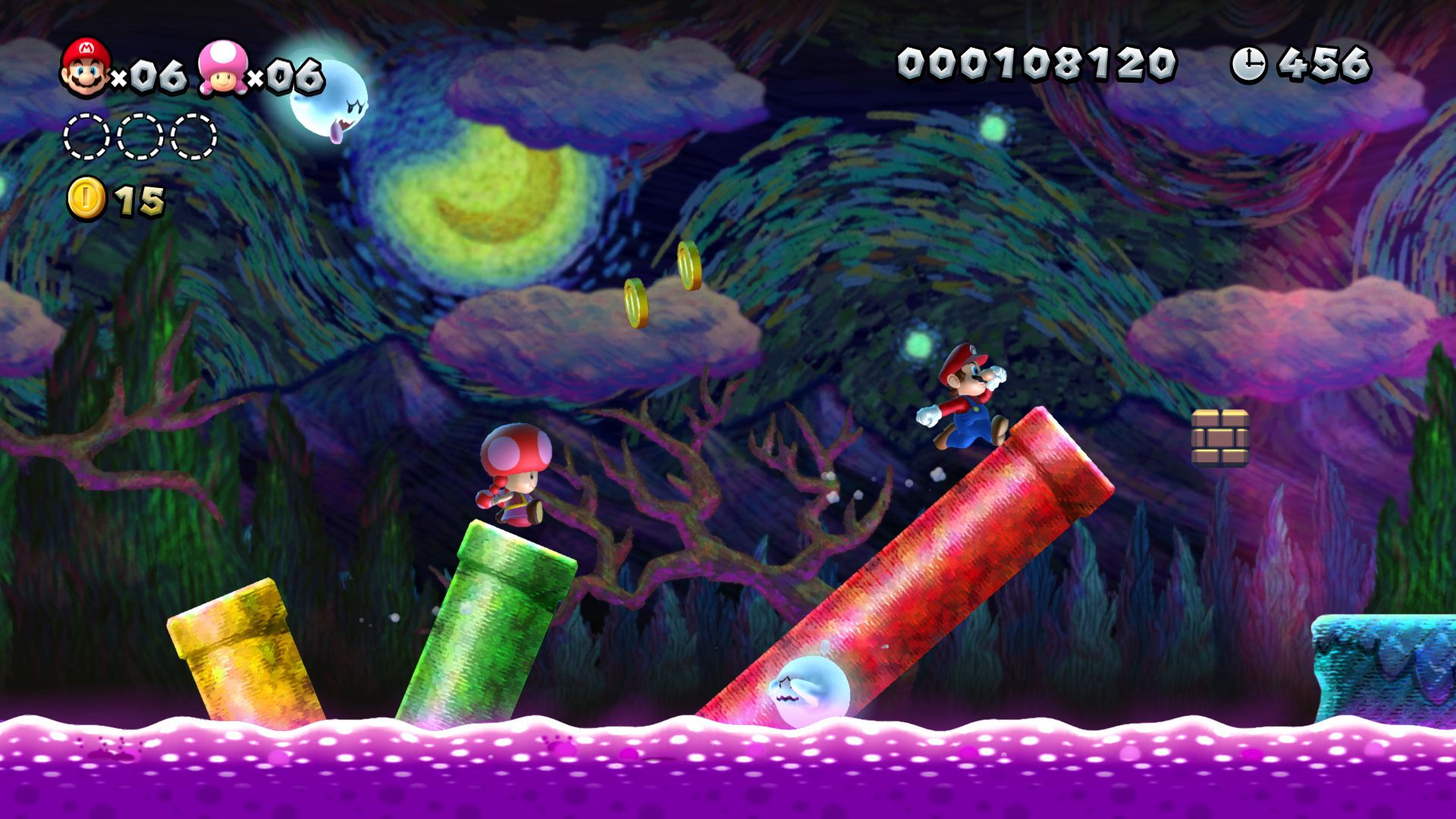 Mario e Toadette corrono attraverso un livello spaventoso in New Super Mario Bros. U Deluxe per Nintendo Switch