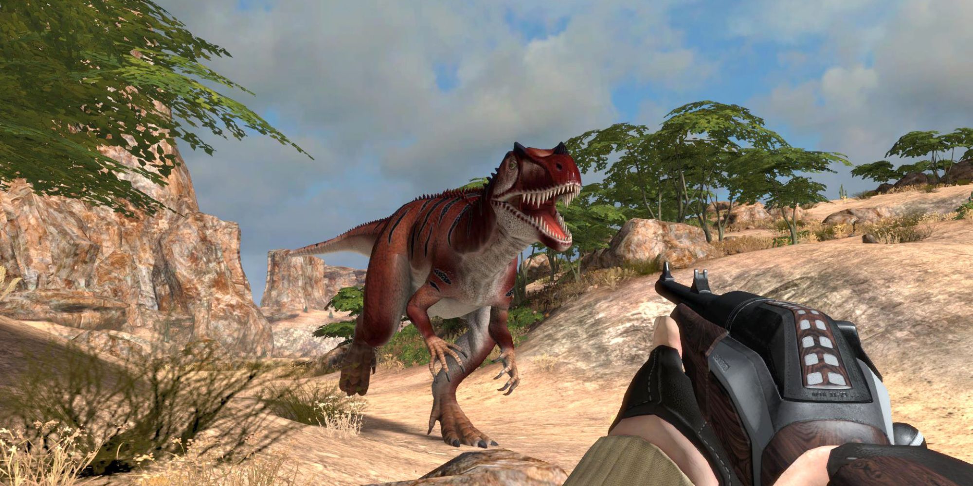 Carnivores: Dinosaur Hunt에서 공룡을 조준하는 플레이어