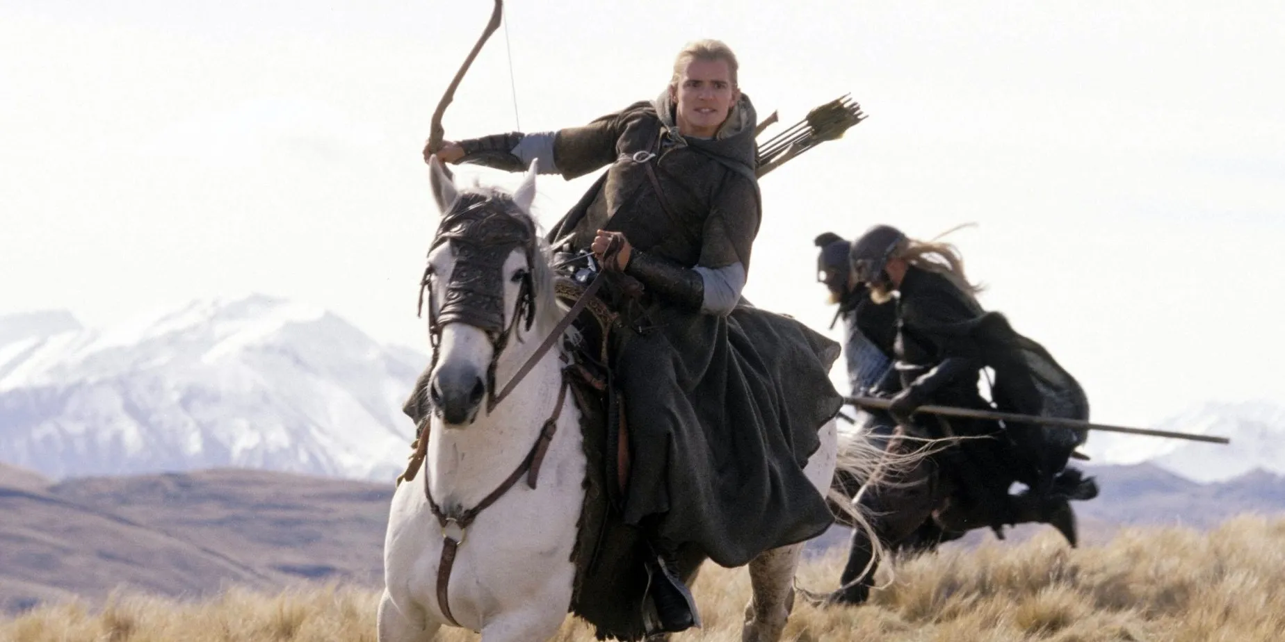 Legolas chevauchant Arod et tenant un arc
