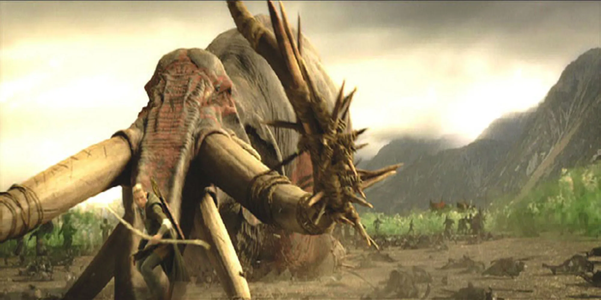 Legolas가 방금 죽인 무야킬 (oliphant)의 줄기를 타고 내려오고 있습니다.