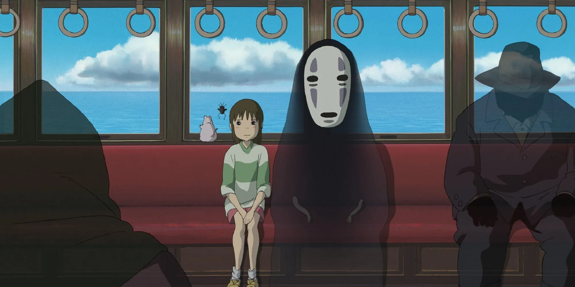 Chihiro e No-Face che siedono insieme su un treno in Spirited Away