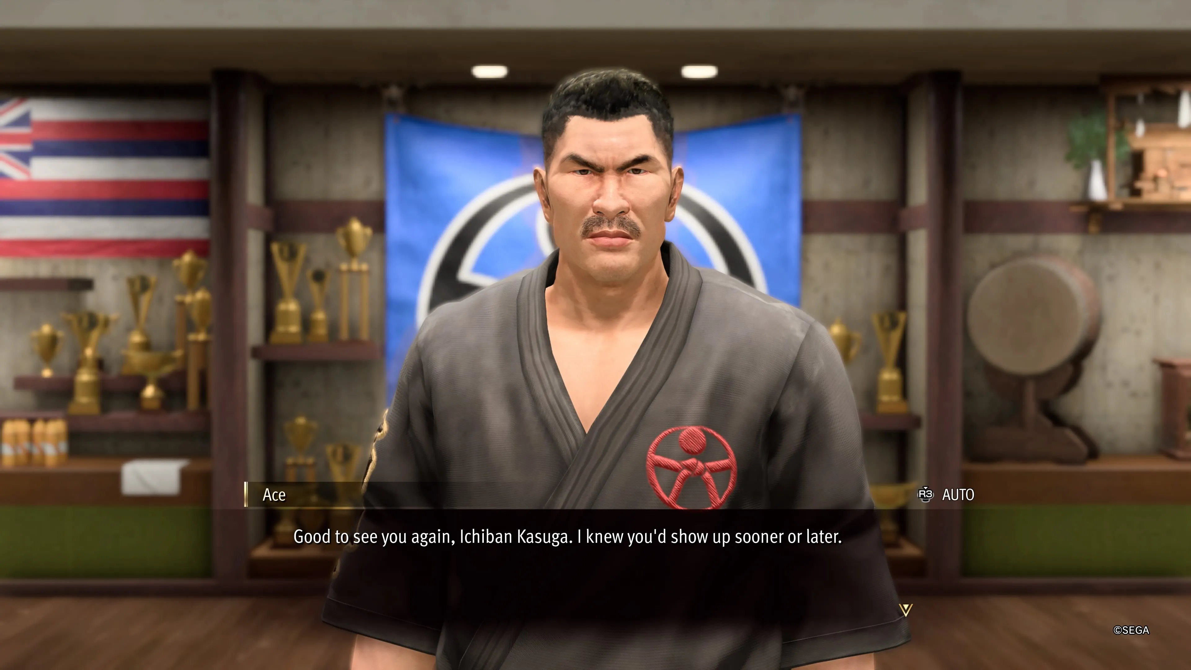 Ace greeting Kasuga and being pleased to see him inside his Dojo for a battle in Like A Dragon: Infinite Wealth.