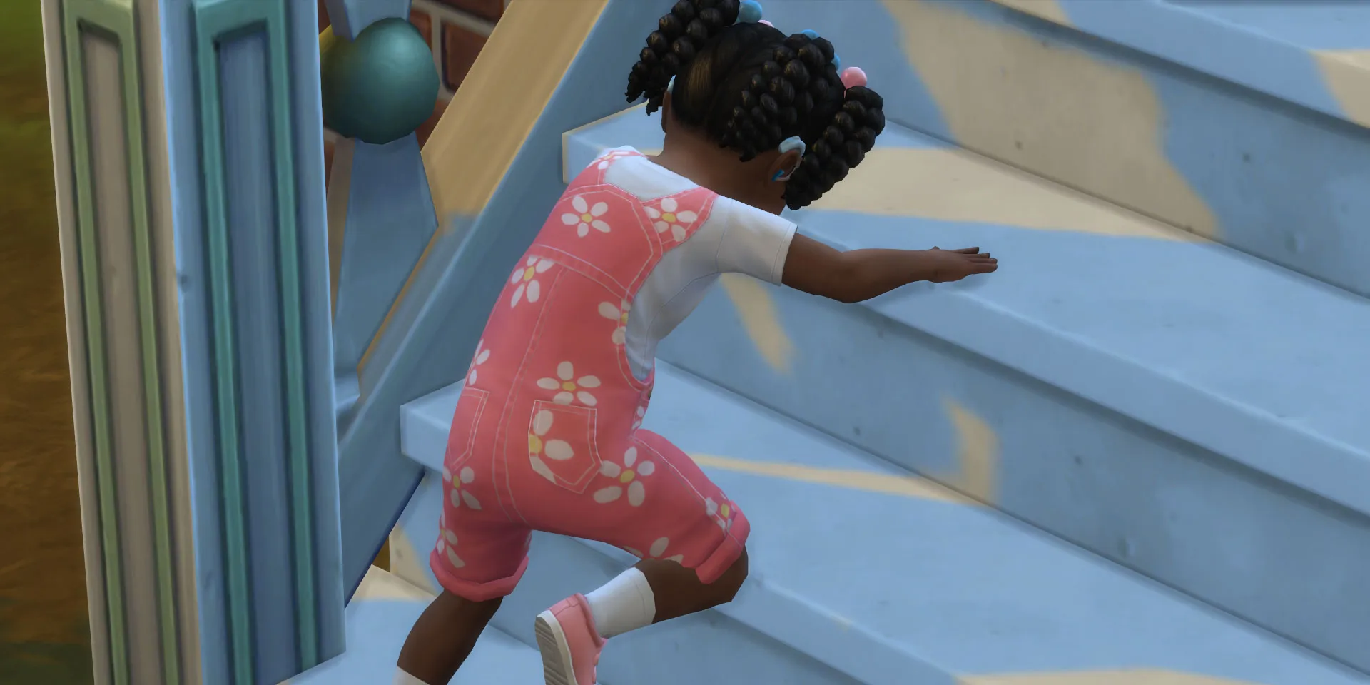 Un bambino che scende da una piccola scala in The Sims 4.