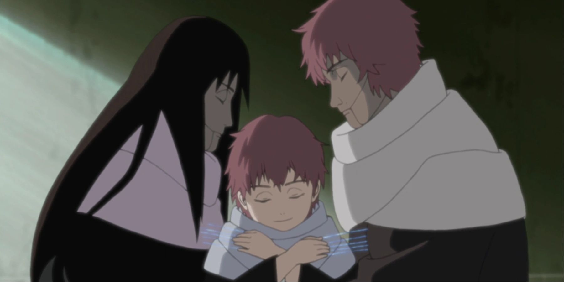 Un giovane Sasori in cerca di affetto dalle sue marionette madre e padre in Naruto