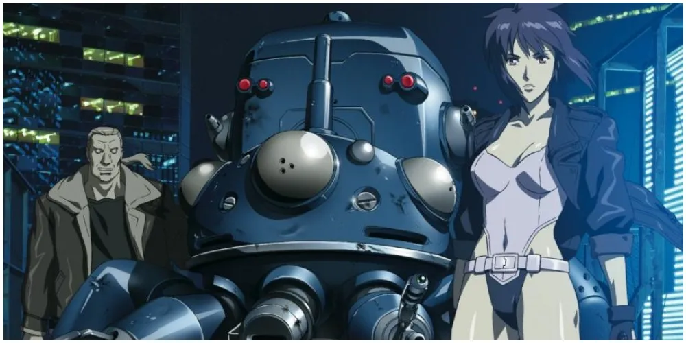 A man and woman stand next to a large robot.