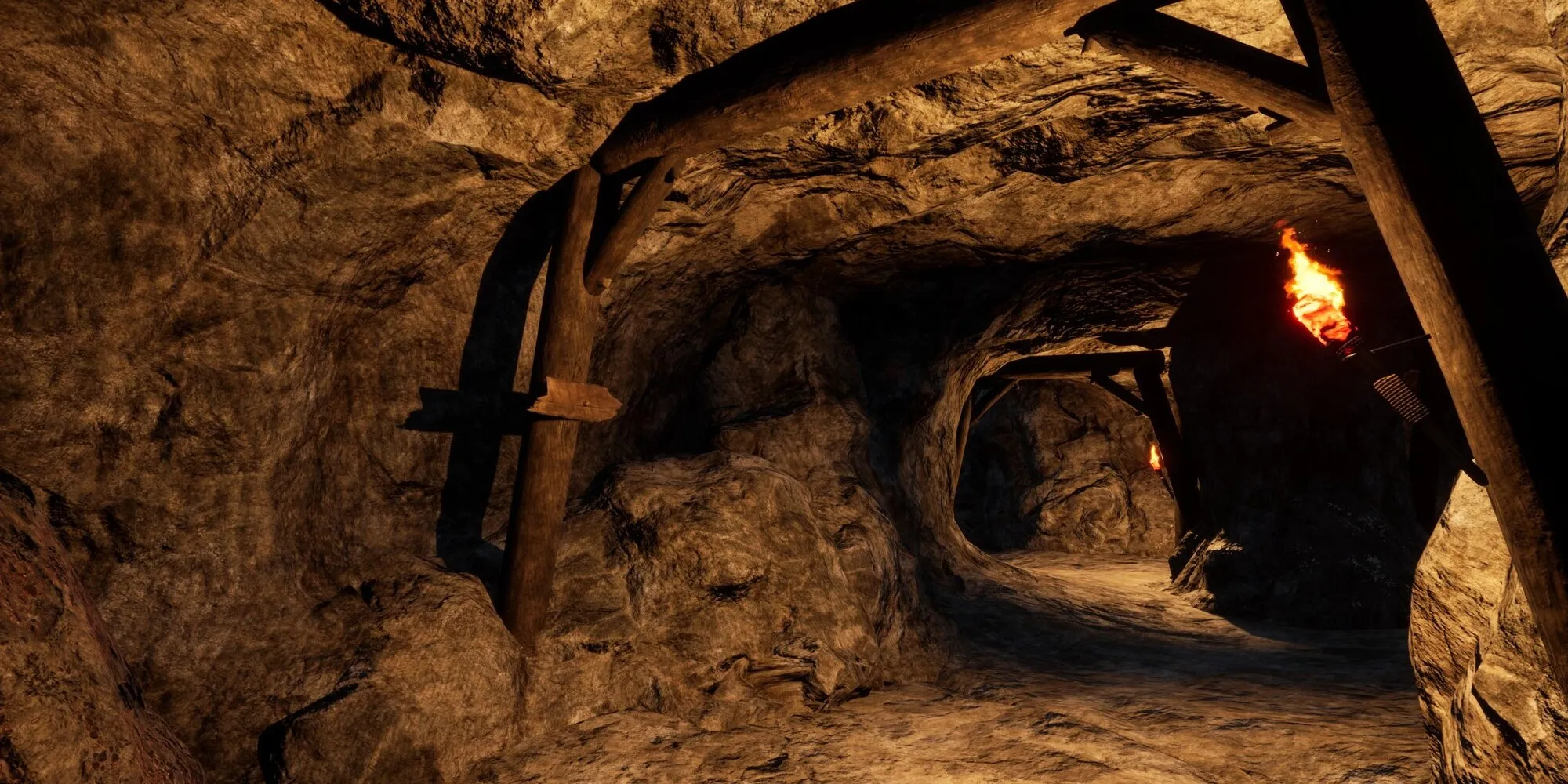 joueur debout à l'intérieur d'une mine avec un éclairage