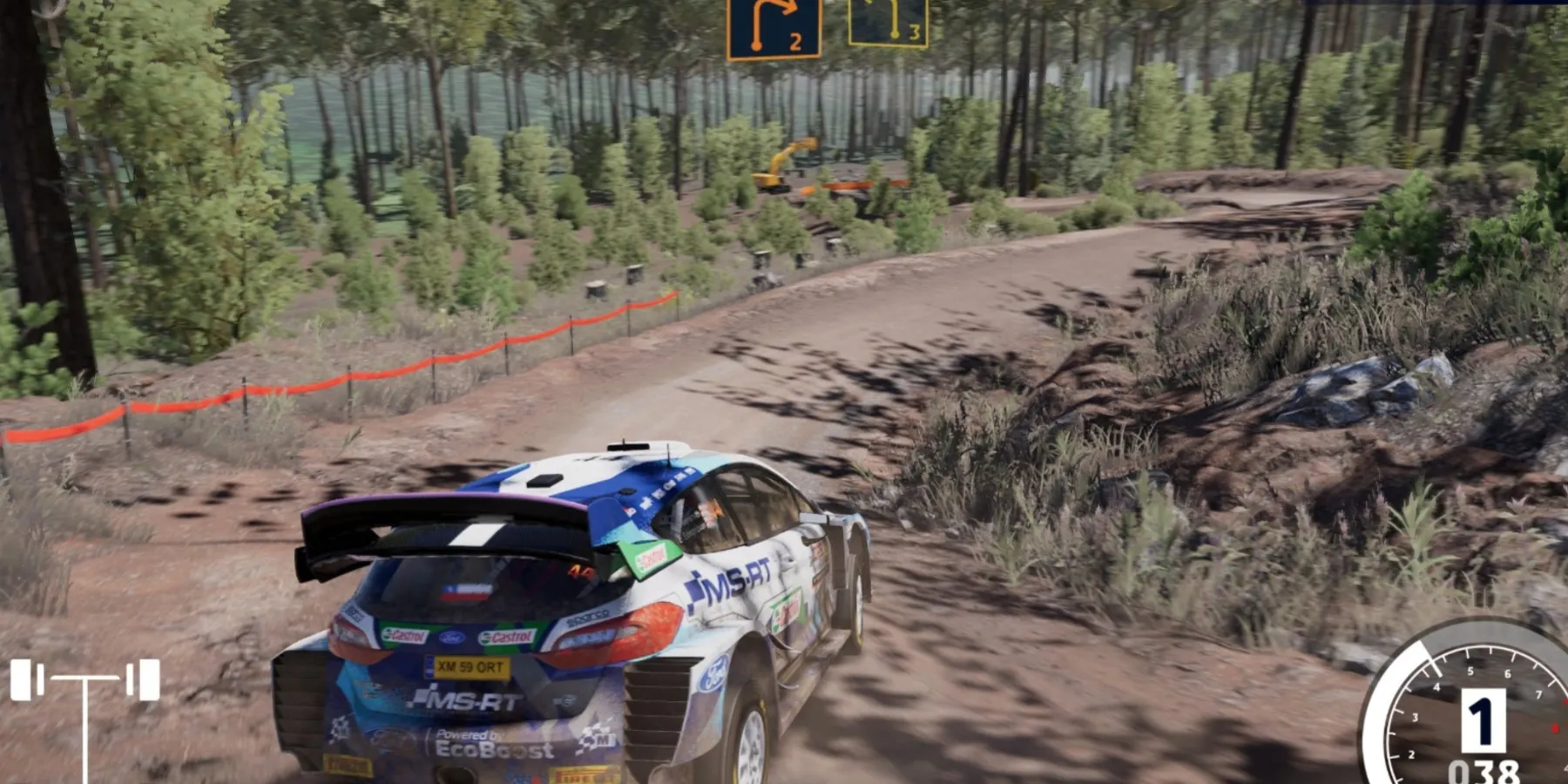 Rally car drifting on a dirt path