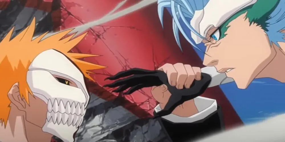 Ichigo with his mask activated holding back Grimmjow’s punch