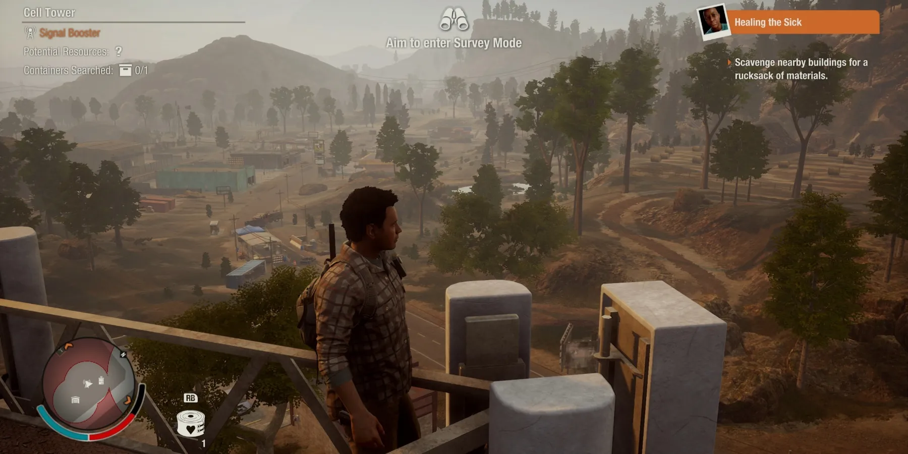 The player standing on a high metal structure looking out into nature