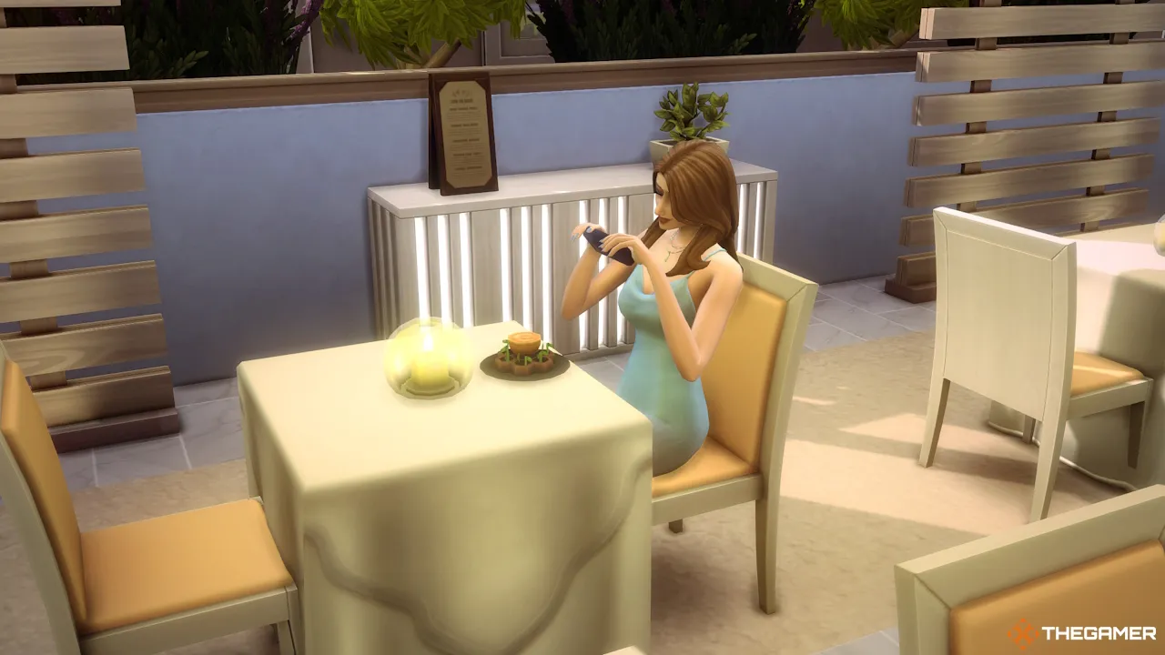 A Sim takes a photo of experimental food at a restaurant