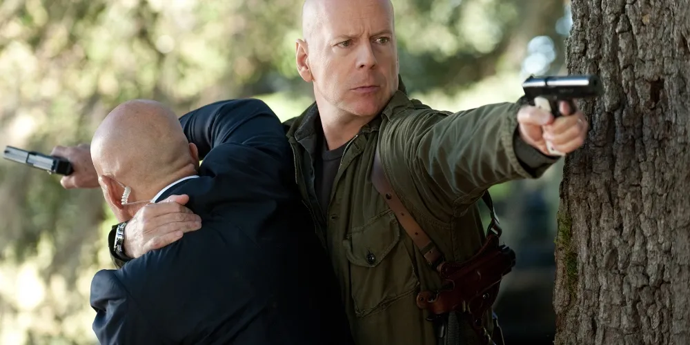 Bruce Willis con una pistola