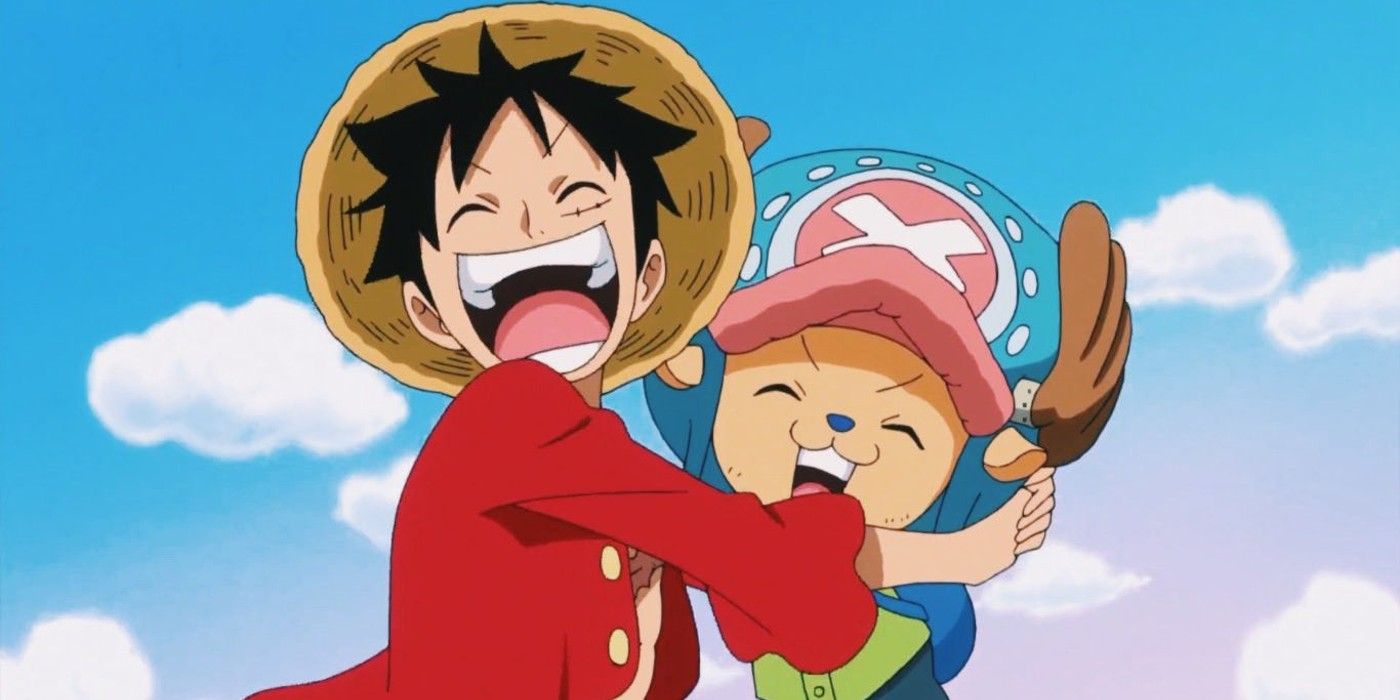 Luffy e Chopper che si abbracciano e ridono in One Piece