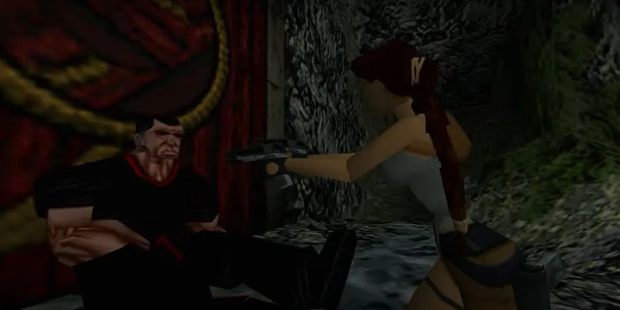 툼 레이더 2의 Lara Croft가 사람에게 맞서는 장면