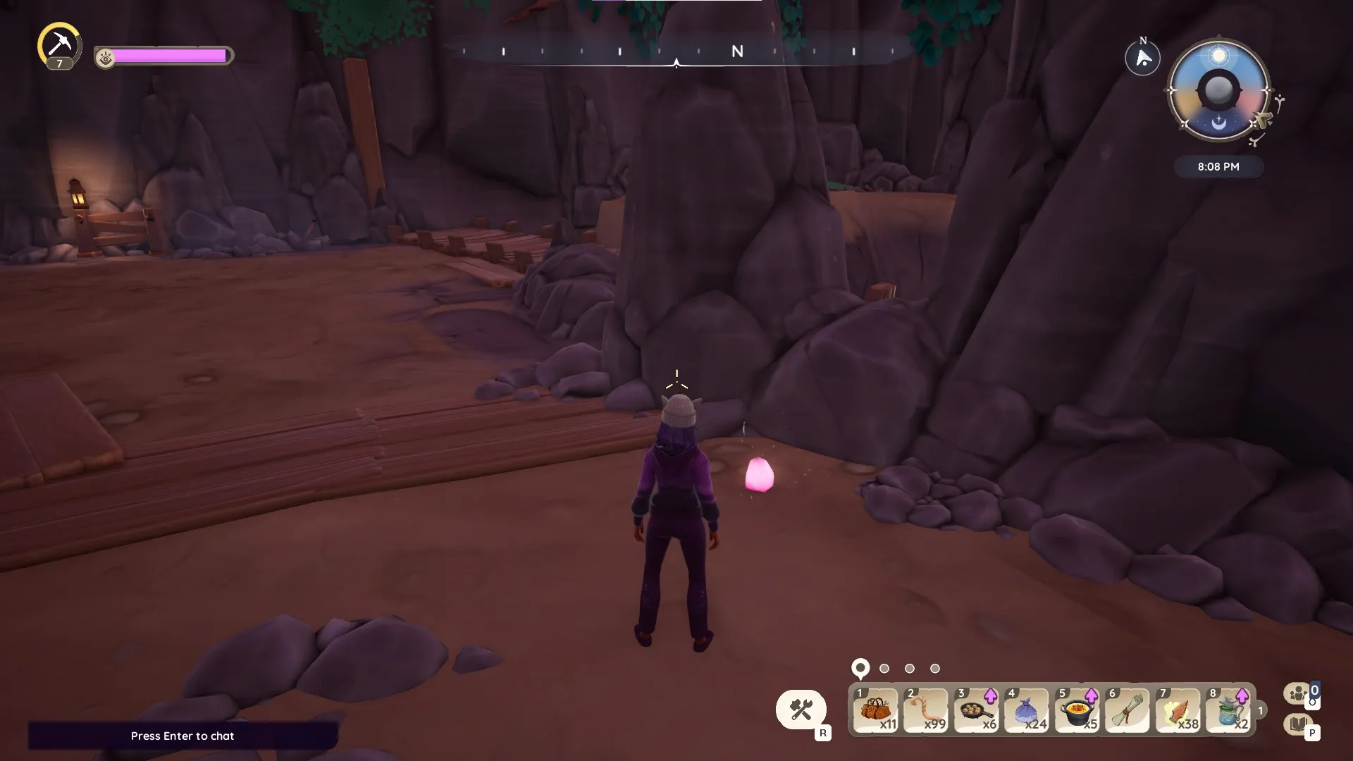 为Plumehound朝圣任务展示对应游戏中的‘出口附近’流石位置的Palia流石，附近有一个角色站在旁边。