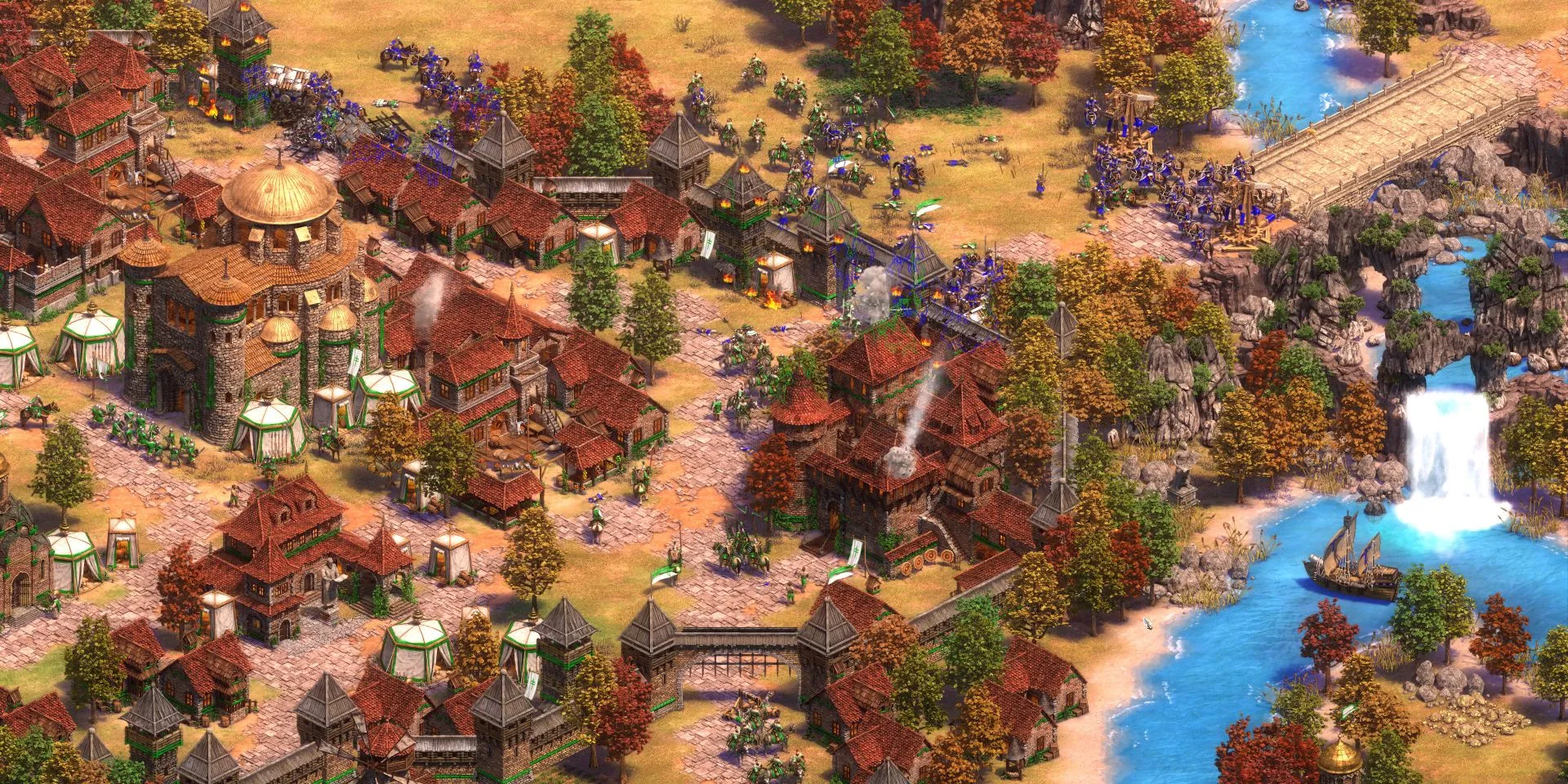 The purple player attacks the green player’s village in Age of Empires 2 Definitive Edition