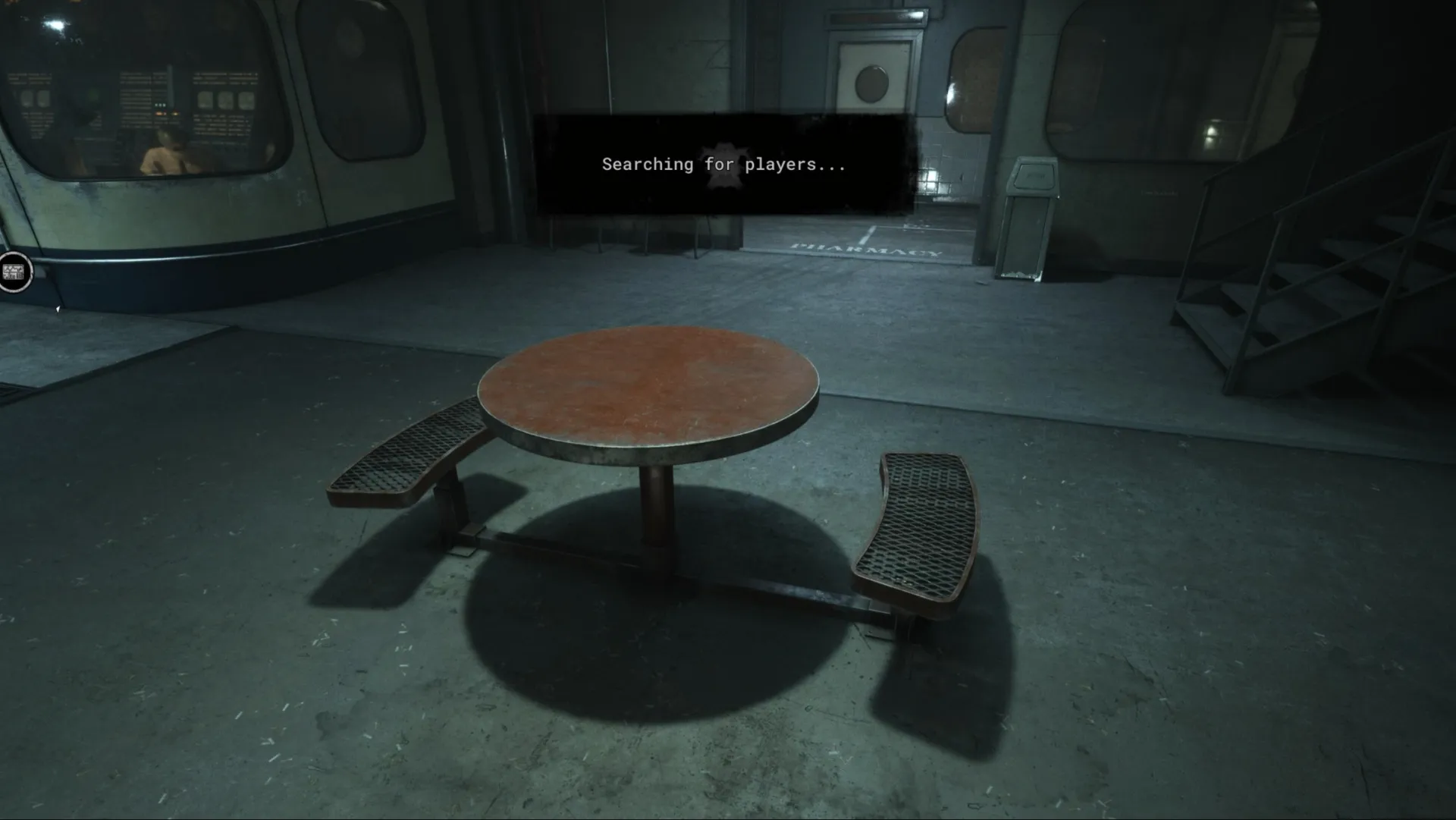 The table used for arm wrestling matches while you wait for a trial to start in The Outlast Trials.