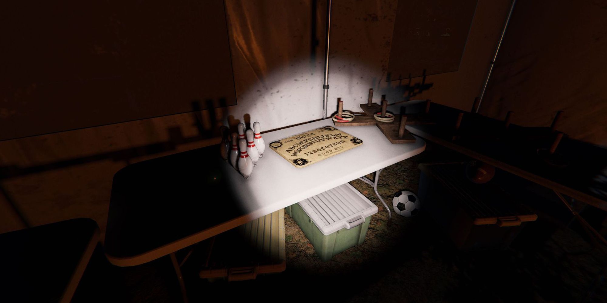 Image depicts a Ouija Board on a white table next to bowling pins and a wooden hoop game. This is from Camp Woodwind in Phasmophobia.