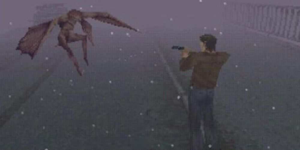 Harry Mason fighting a flying enemy in the streets of Silent Hill.