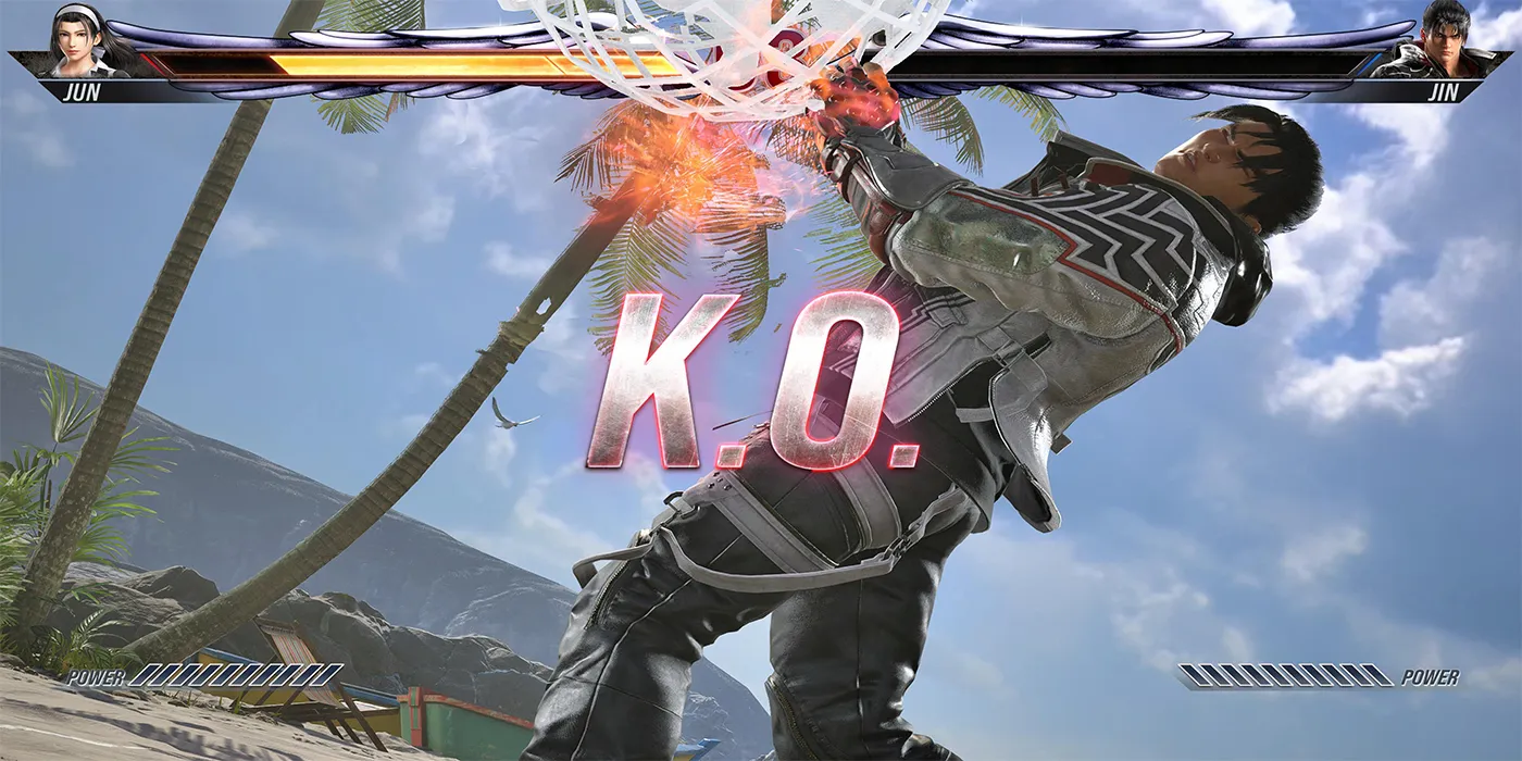 Jin Kazama recibe un golpe de una bola del mundo durante un juego de Tekken Ball en la playa en Tekken 8.