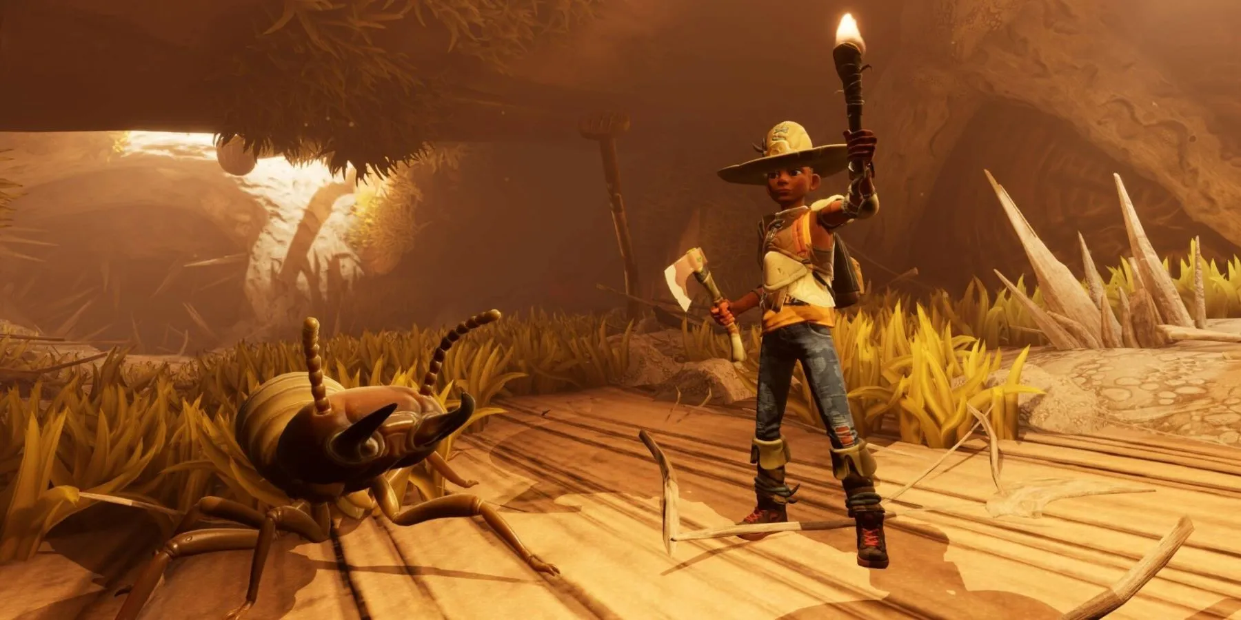 Grounded’s max holding a torch and axe while standing next to an insect