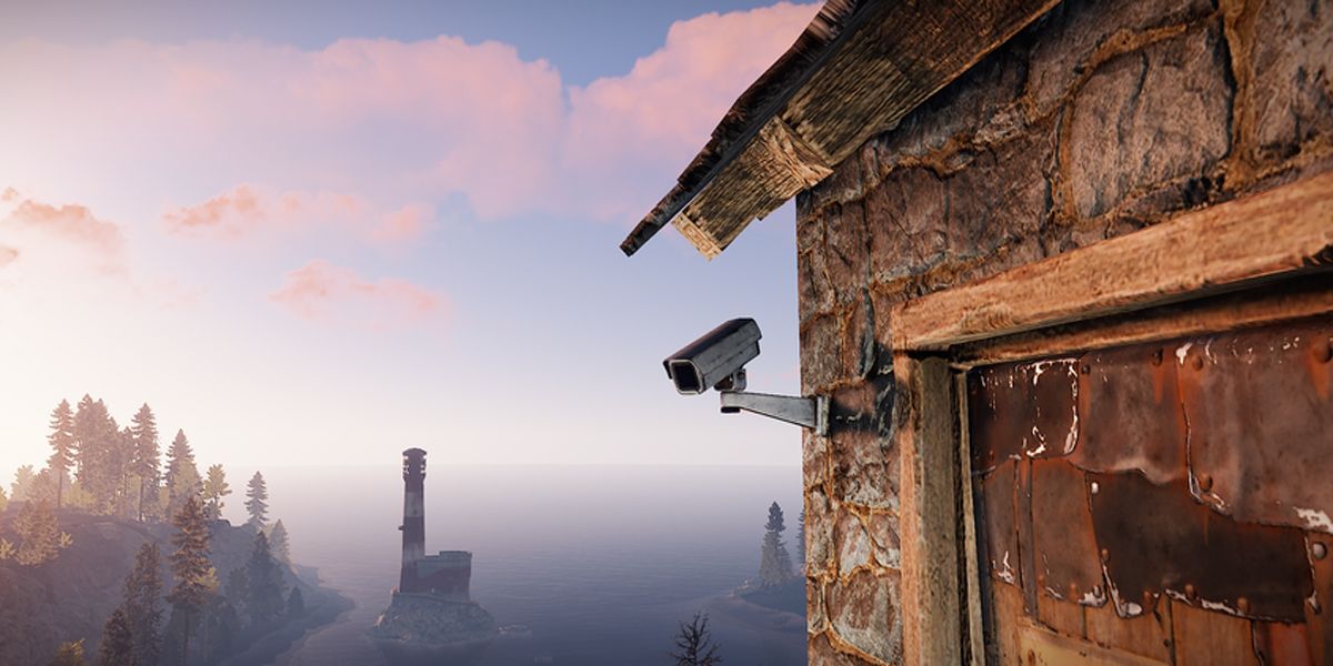 A camera on side of building overlooking a lighthouse in Rust