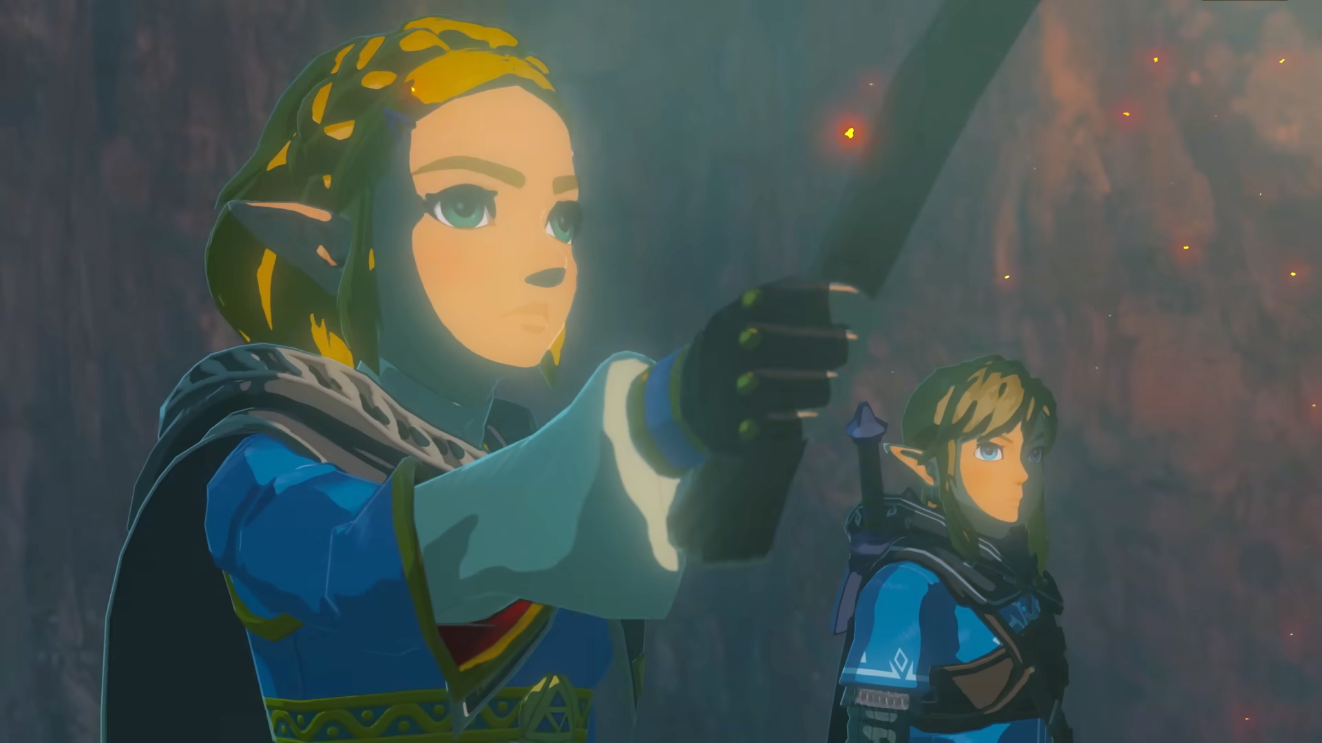 Zelda tiene una torcia mentre lei e Link osservano qualcosa in Tears of the Kingdom.