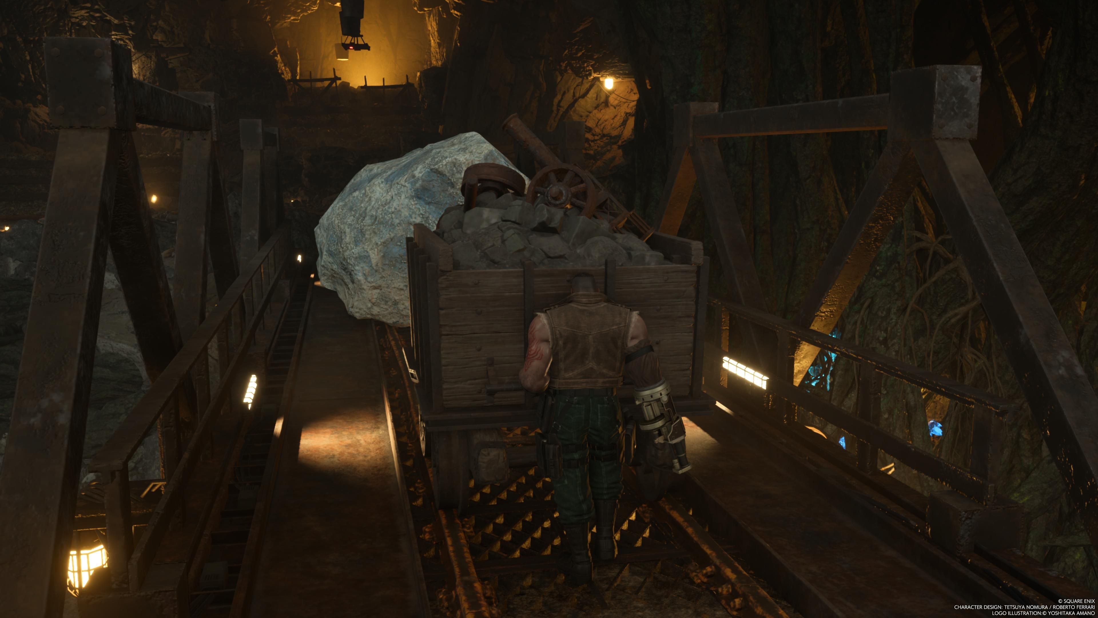 Barret pousse un chariot de mine dans la Mine de Mythril de FF7 Rebirth