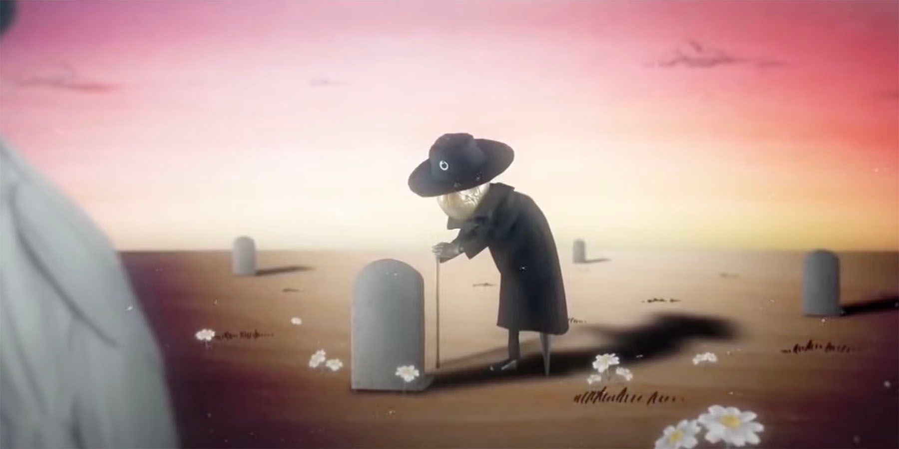 man visiting grave