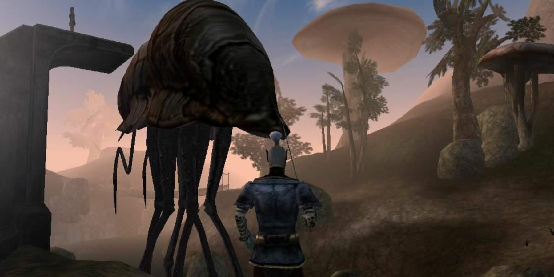来自 Morrowind 的图像，显示一个暗精灵站在壤蟹旁边的画面