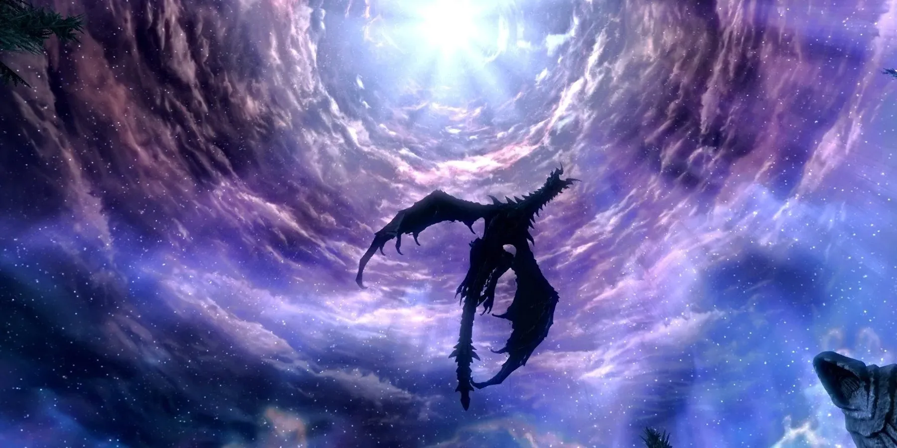 Immagine di Alduin che vola nel cielo alla fine di Skyrim
