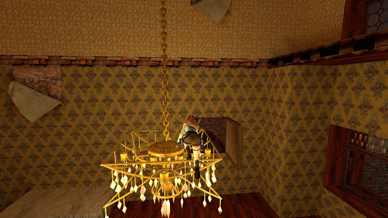 Lara Croft climbs a chandelier