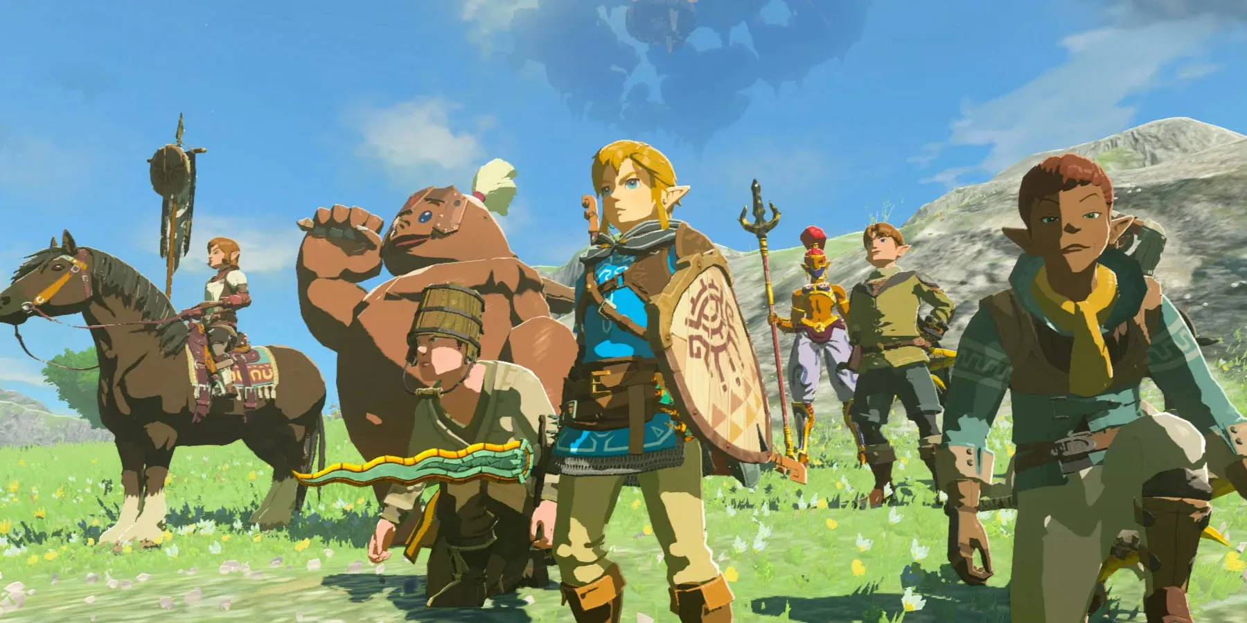 Una captura de pantalla de Link y sus amigos parados en un campo de hierba en The Legend of Zelda: Tears of the Kingdom.