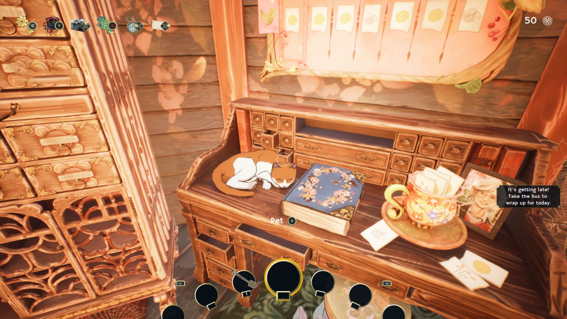 A cute sleeping cat on Robin’s desk in Garden Life: A Cozy Simulator. You can pet it!