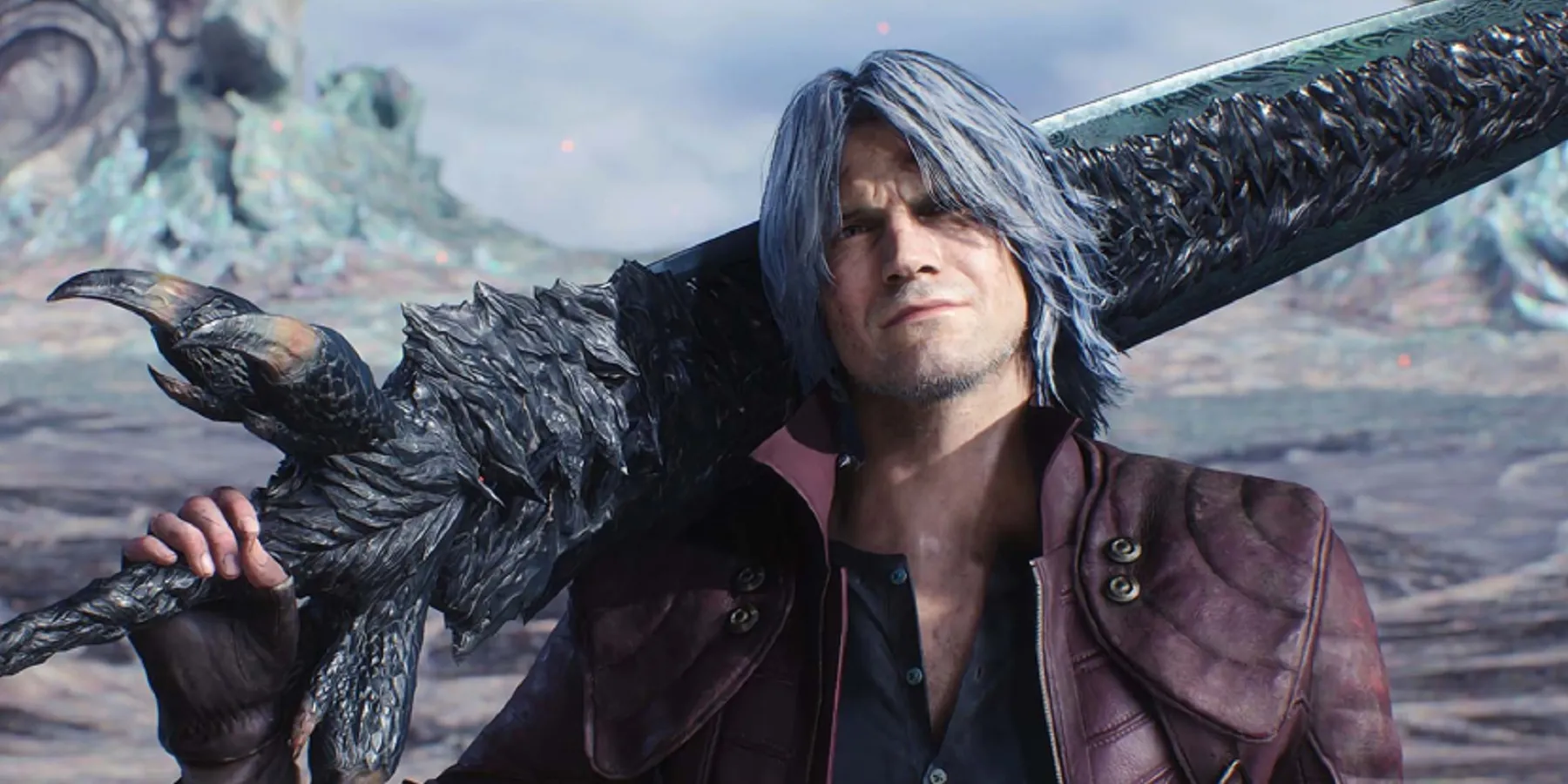 Devil May Cry 5 Dante carries a sword slung over his shoulder while staring at the viewer.