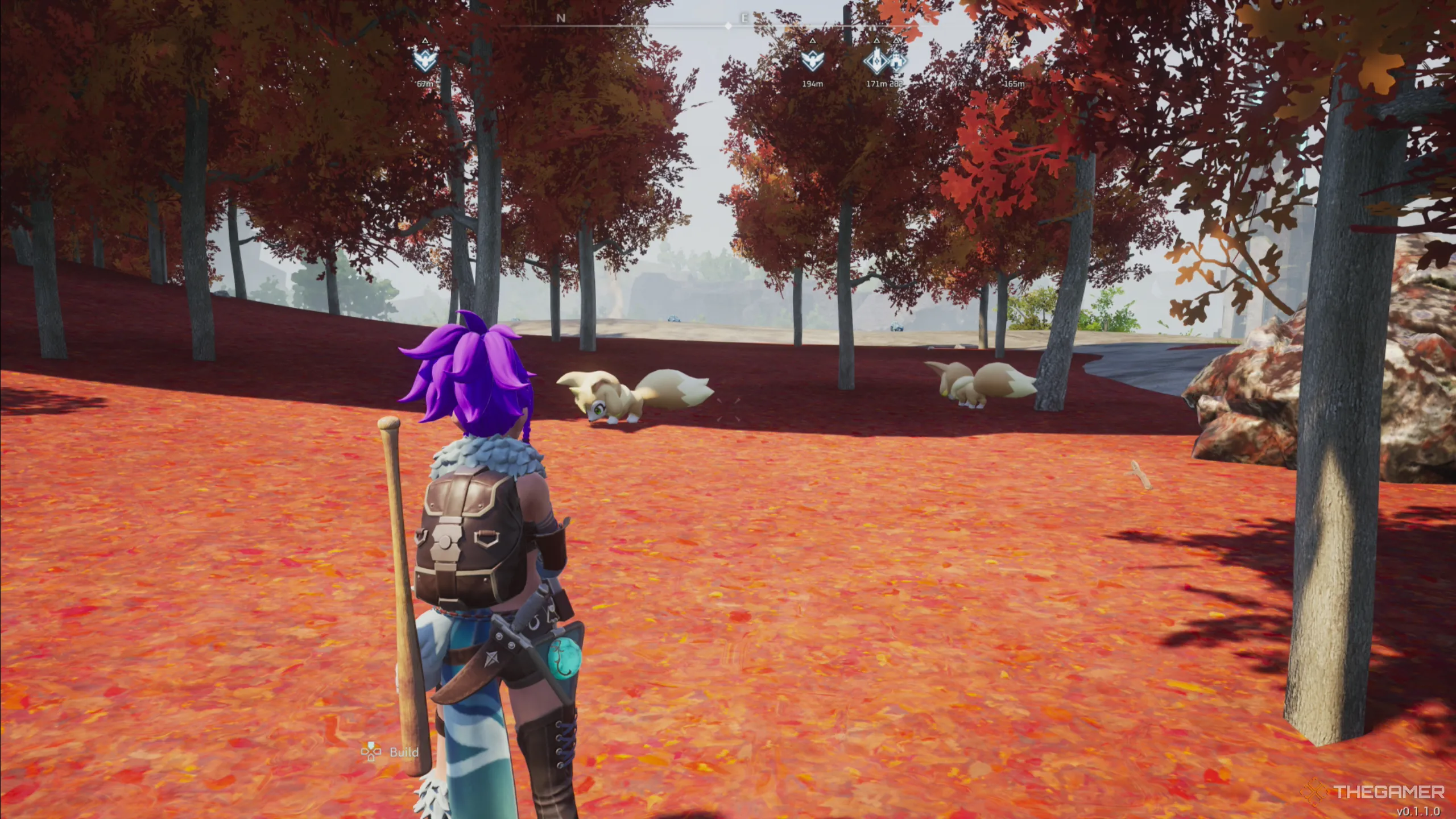 Palworld: 真っ赤な草と木々の中で2匹の Vixy を見て立っている様子