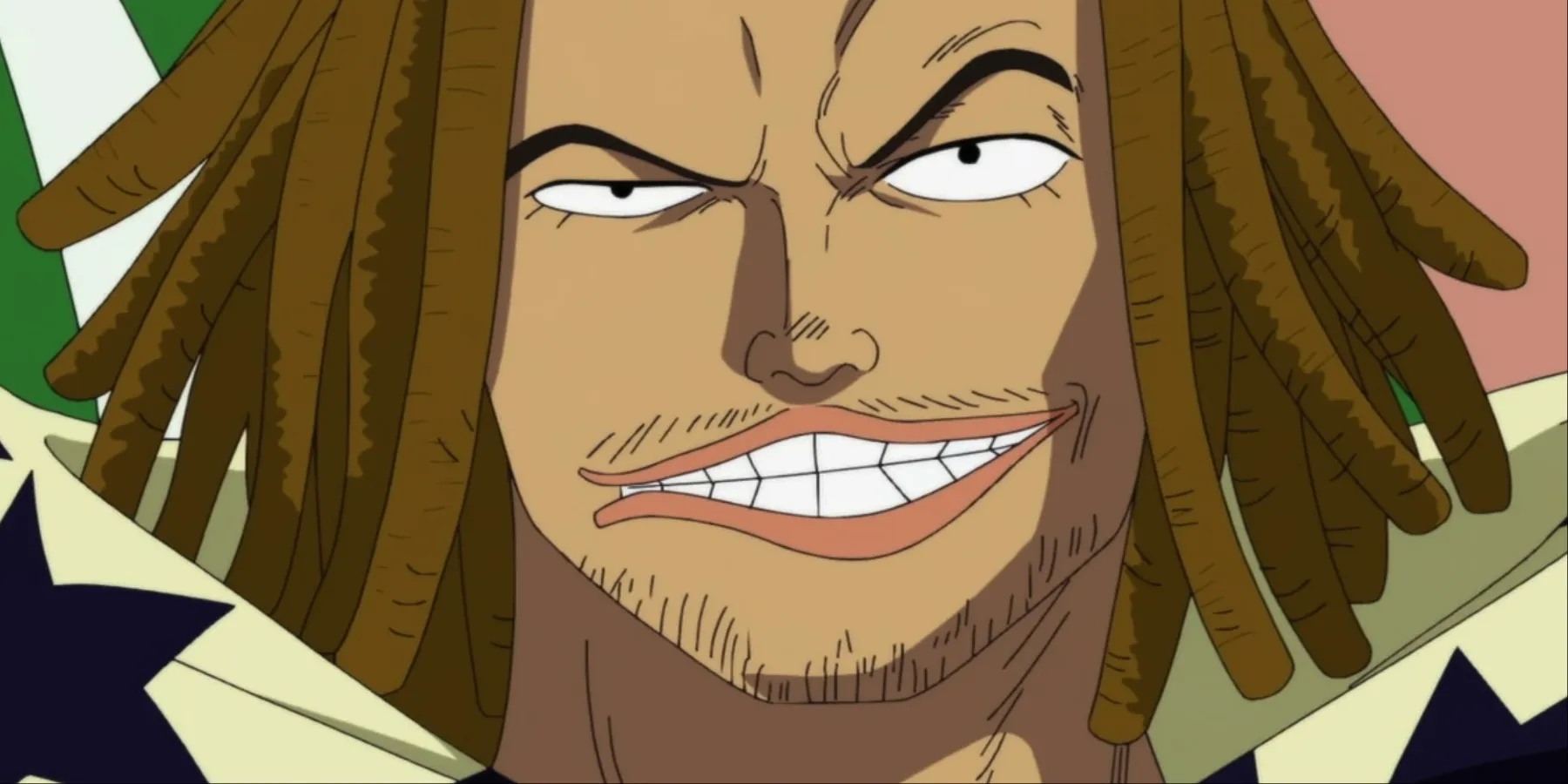 Yassop dei Pirati dei Capelli Rossi di One Piece che sorride