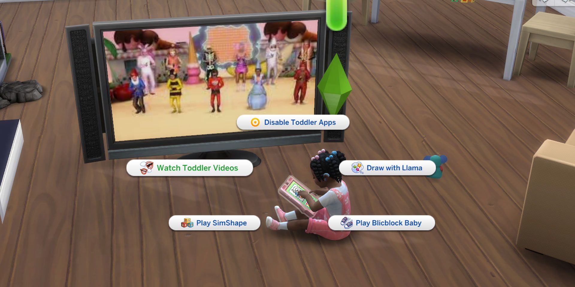 A toddler Sim using the Wabbit Tablet, the option to Watch Toddler Videos is selected.