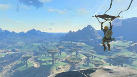 Link vola attraverso il cielo sul suo deltaplano in Tears of the Kingdom.