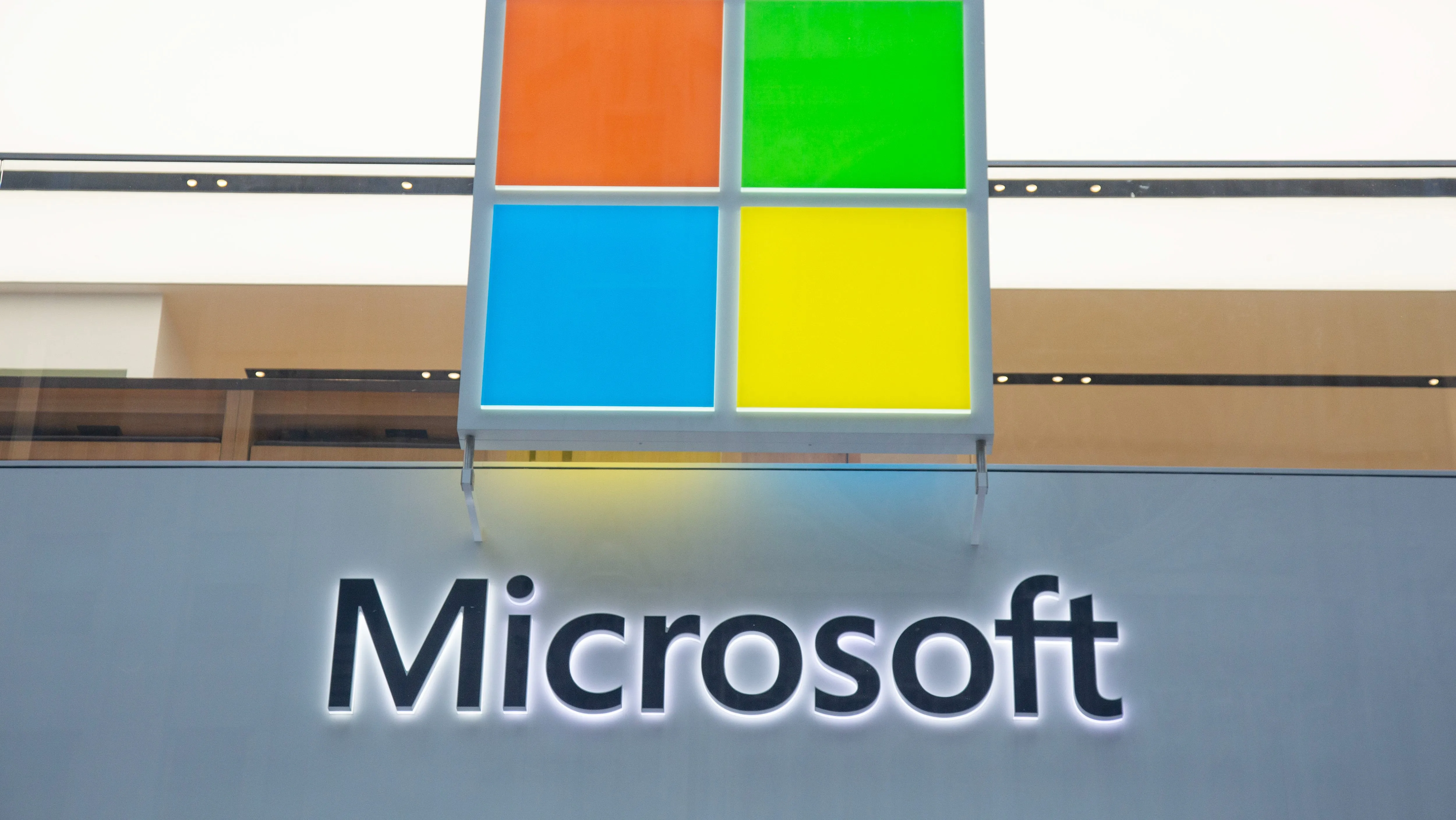 A Microsoft store entrance with the company’s logo