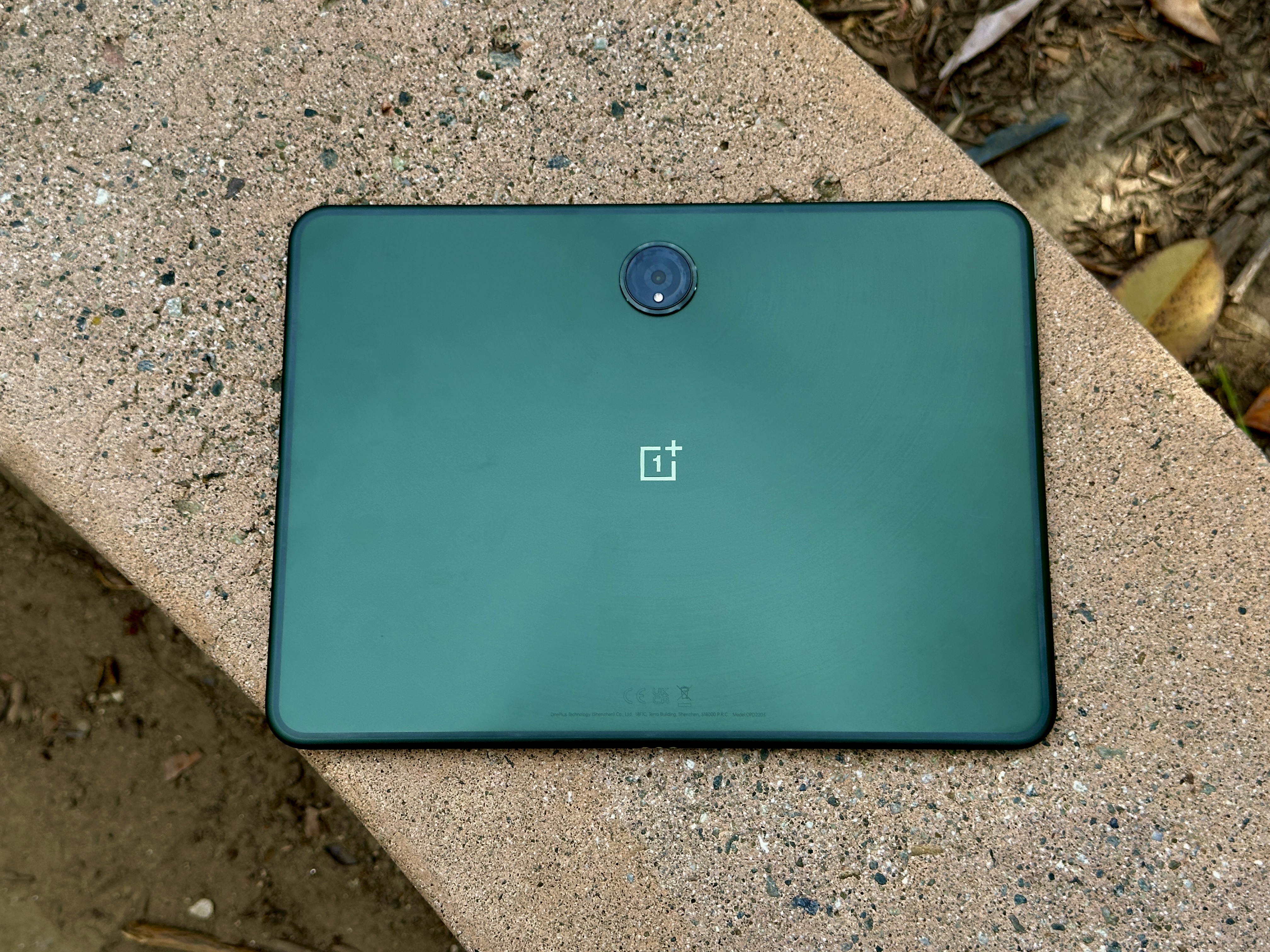 oneplus pad review on concrete bench