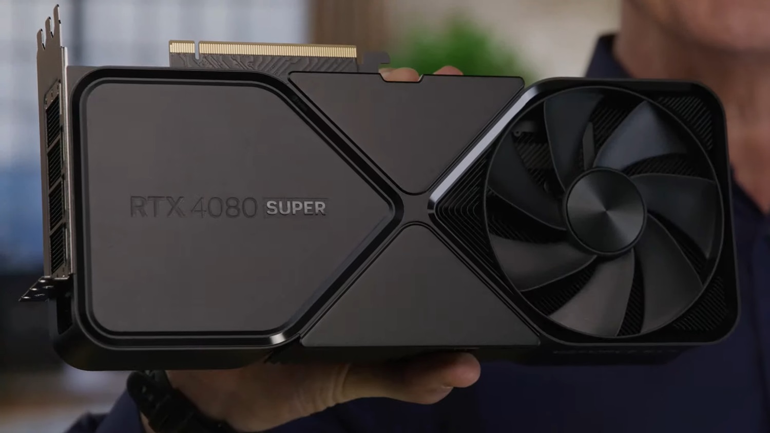 Jeff Fisher holding the RTX 4080 Super at CES 2024