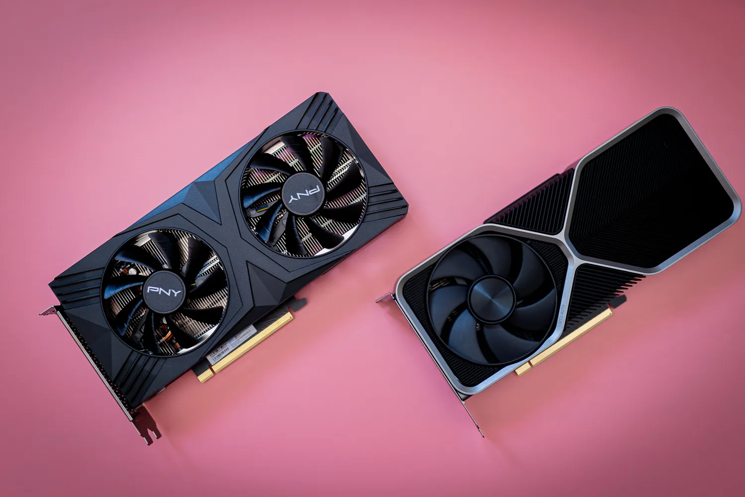 Nvidia’s RTX 4070 graphics cards over a pink background.