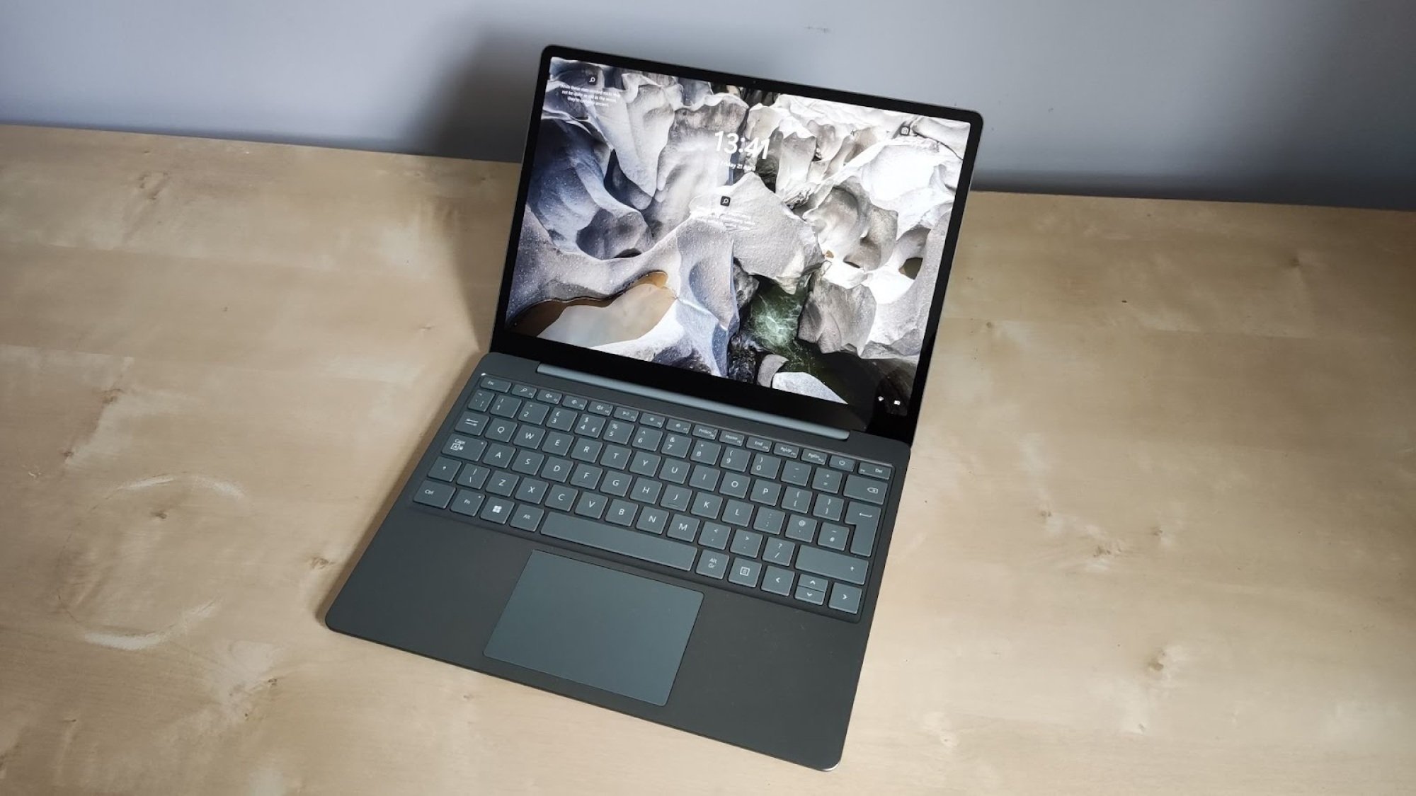 Microsoft Surface Laptop Go 2 on desk with open screen