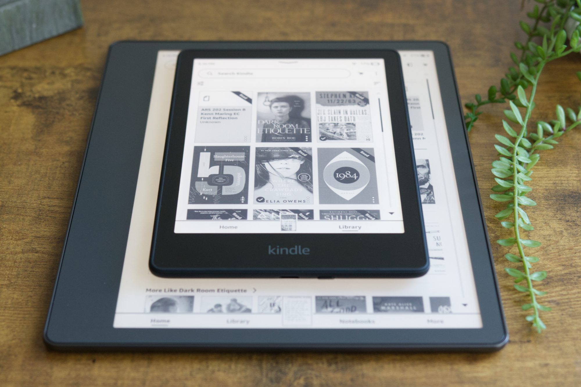 Kindle Paperwhite on top of Kindle Scribe